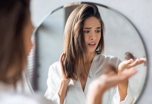 girl losing hair